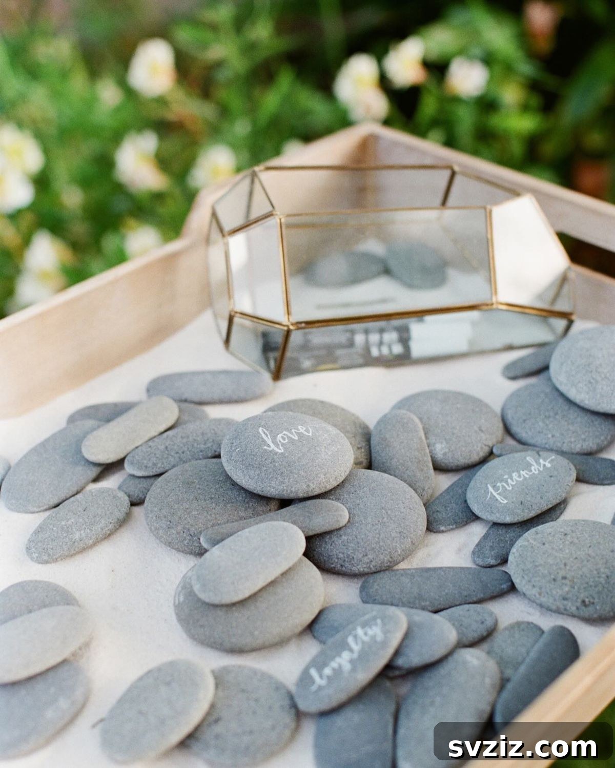 23 Ingenious Wedding Guest Signature Ideas 16 Wishing stones as a wedding guest book alternative, with messages written on smooth stones.