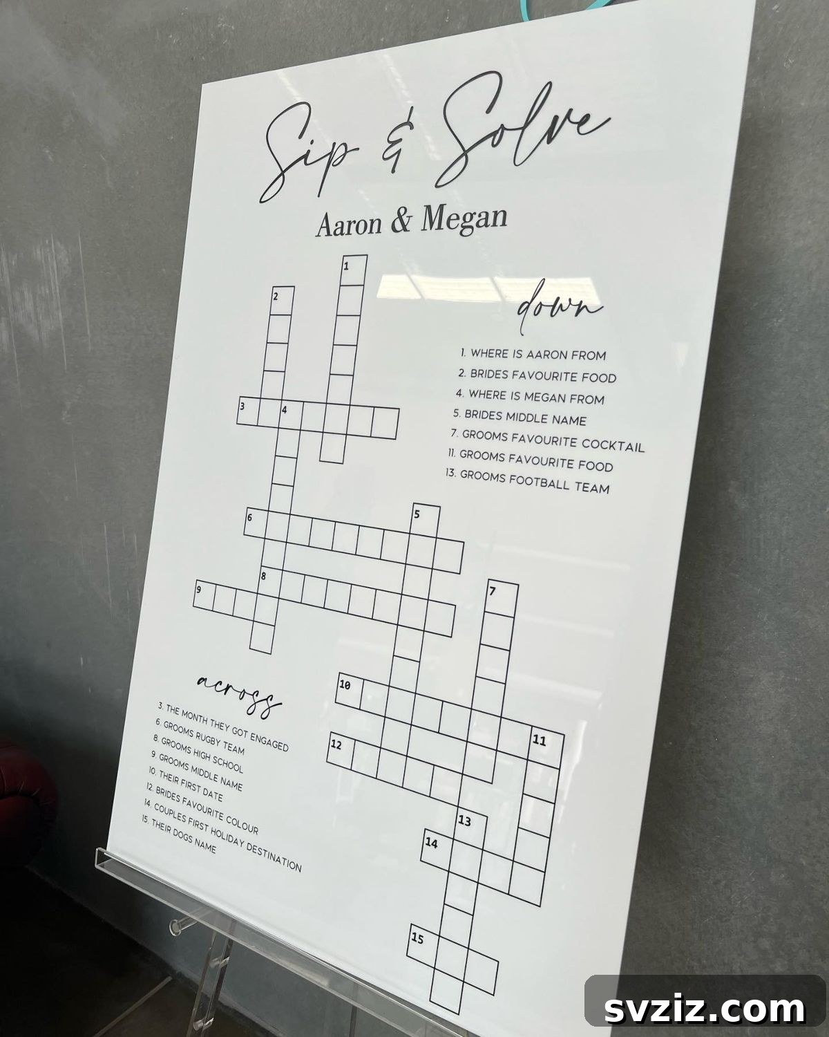 Wedding guests solving a crossword puzzle before getting a drink