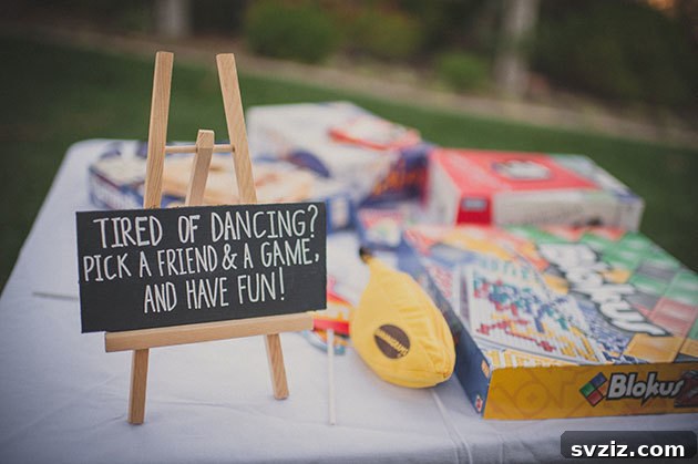 Wedding guests playing board games at a reception
