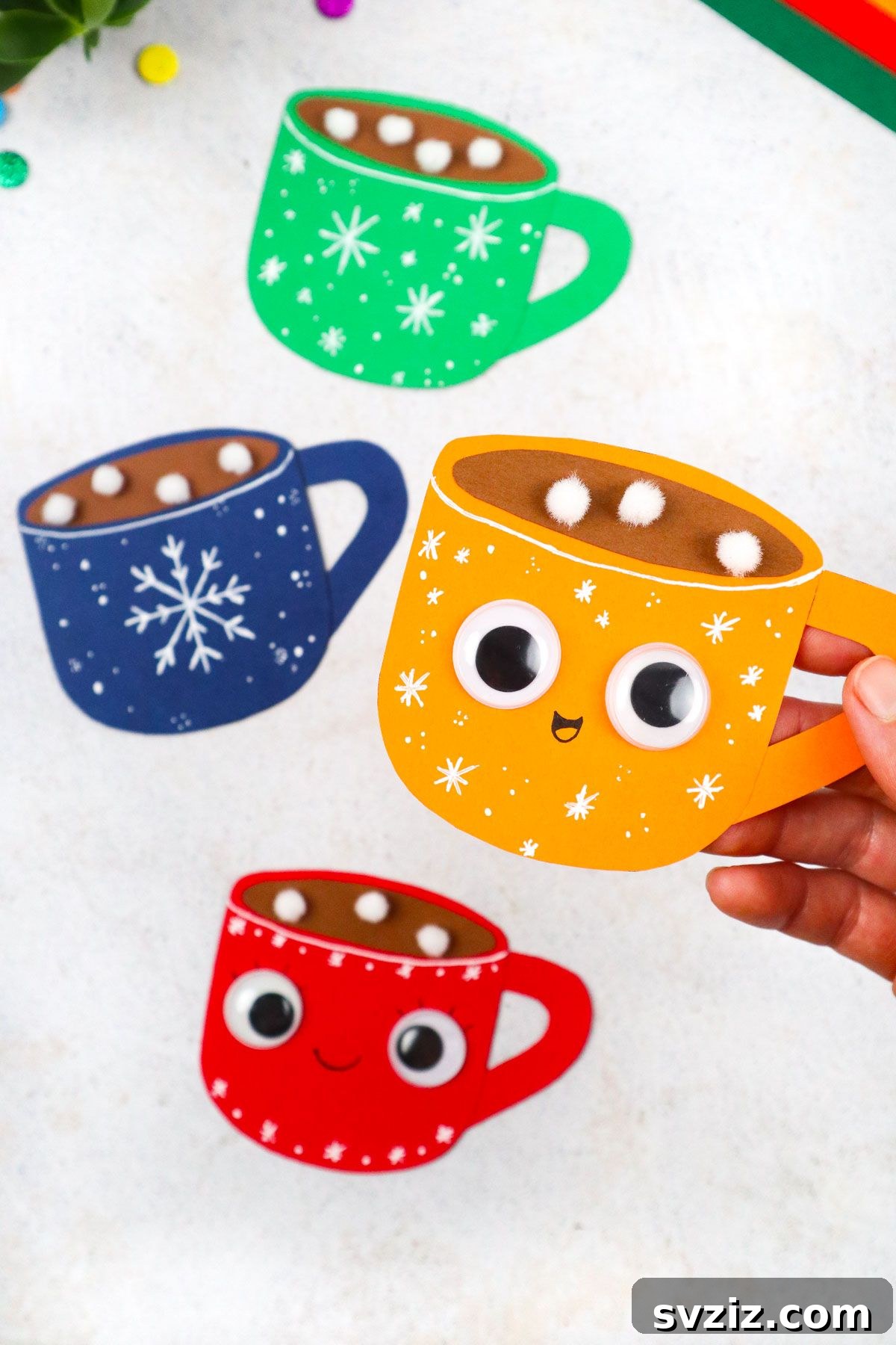 31 Effortless Kids Crafts for Hours of Fun 21 Heartwarming Hot Cocoa Craft made from cardstock, ideal for winter window or wall decorations in classrooms or homes.