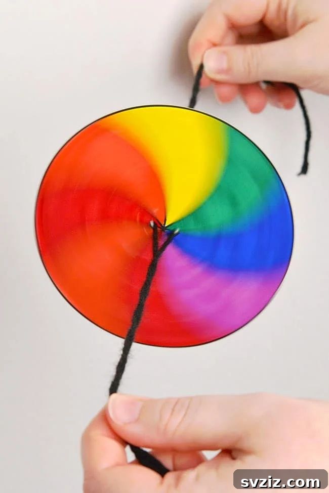 31 Effortless Kids Crafts for Hours of Fun 24 Engaging Spinner Toy craft, a quick-to-assemble project that provides long-term entertainment for kids.