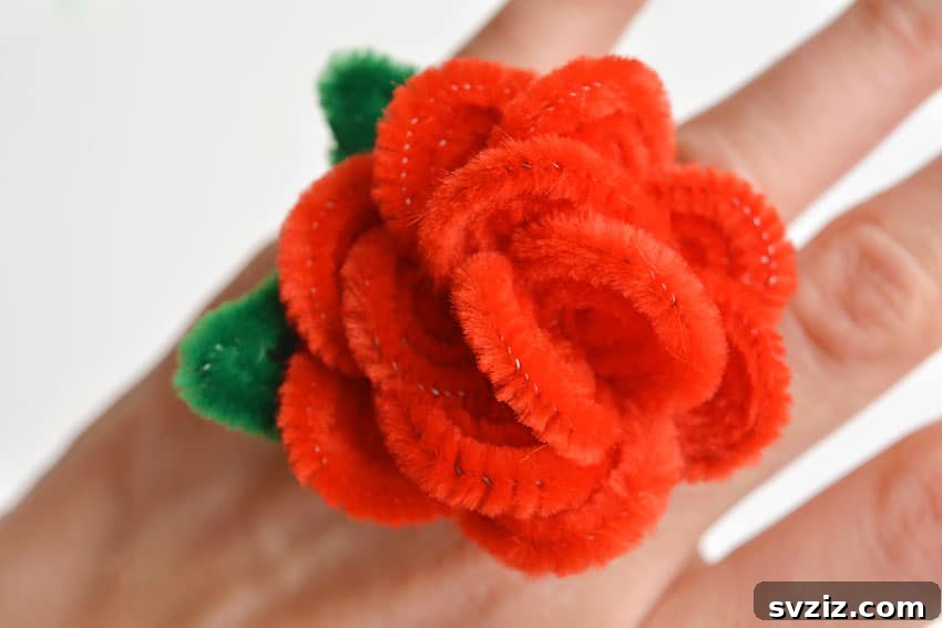 31 Effortless Kids Crafts for Hours of Fun 28 Adorable Pipe Cleaner Butterfly Rings, a mess-free and simple craft for kids using pipe cleaners and scissors.