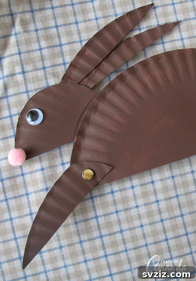 31 Effortless Kids Crafts for Hours of Fun 6 Cute Paper Plate Rabbit craft, an easy and quick art project for kids using simple supplies.