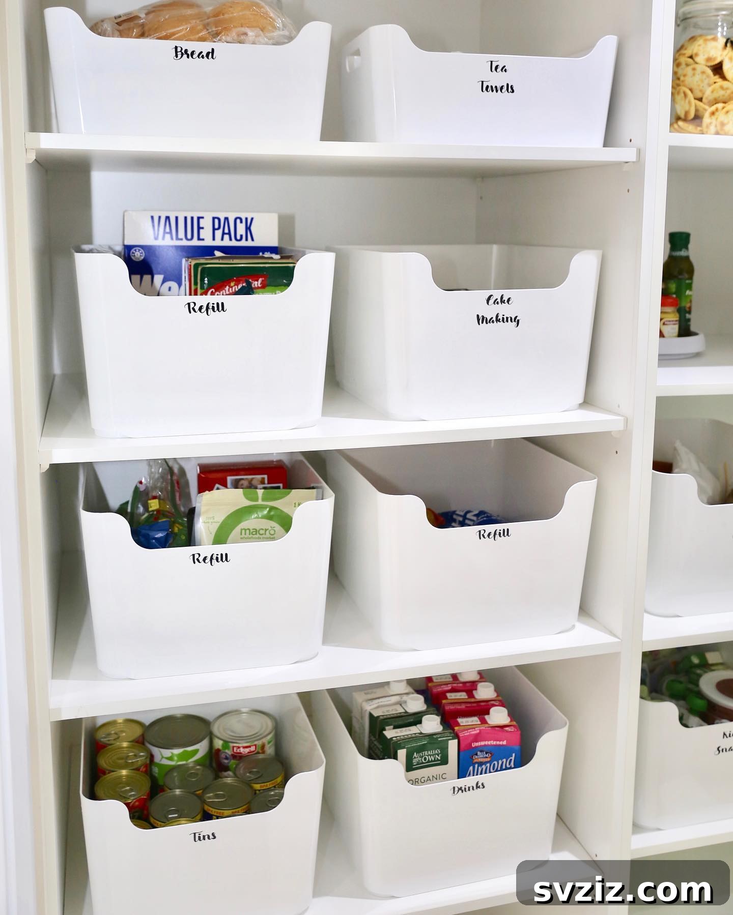 23 Game-Changing IKEA Pantry Hacks 12 10. White Bins with Labels
