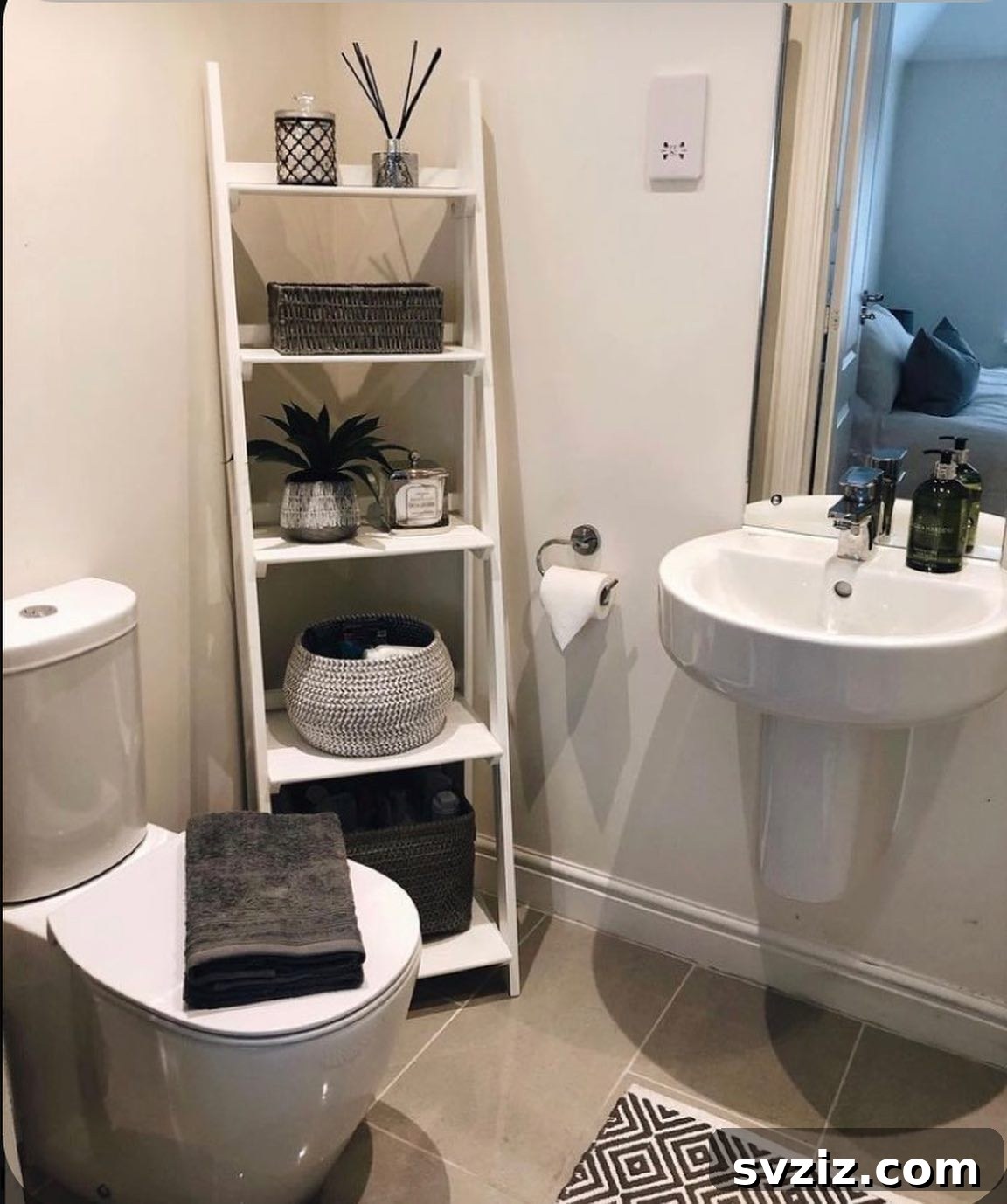 Bathroom Shelves Hack utilizing an IKEA Vilto shelving unit, optimizing corner space.