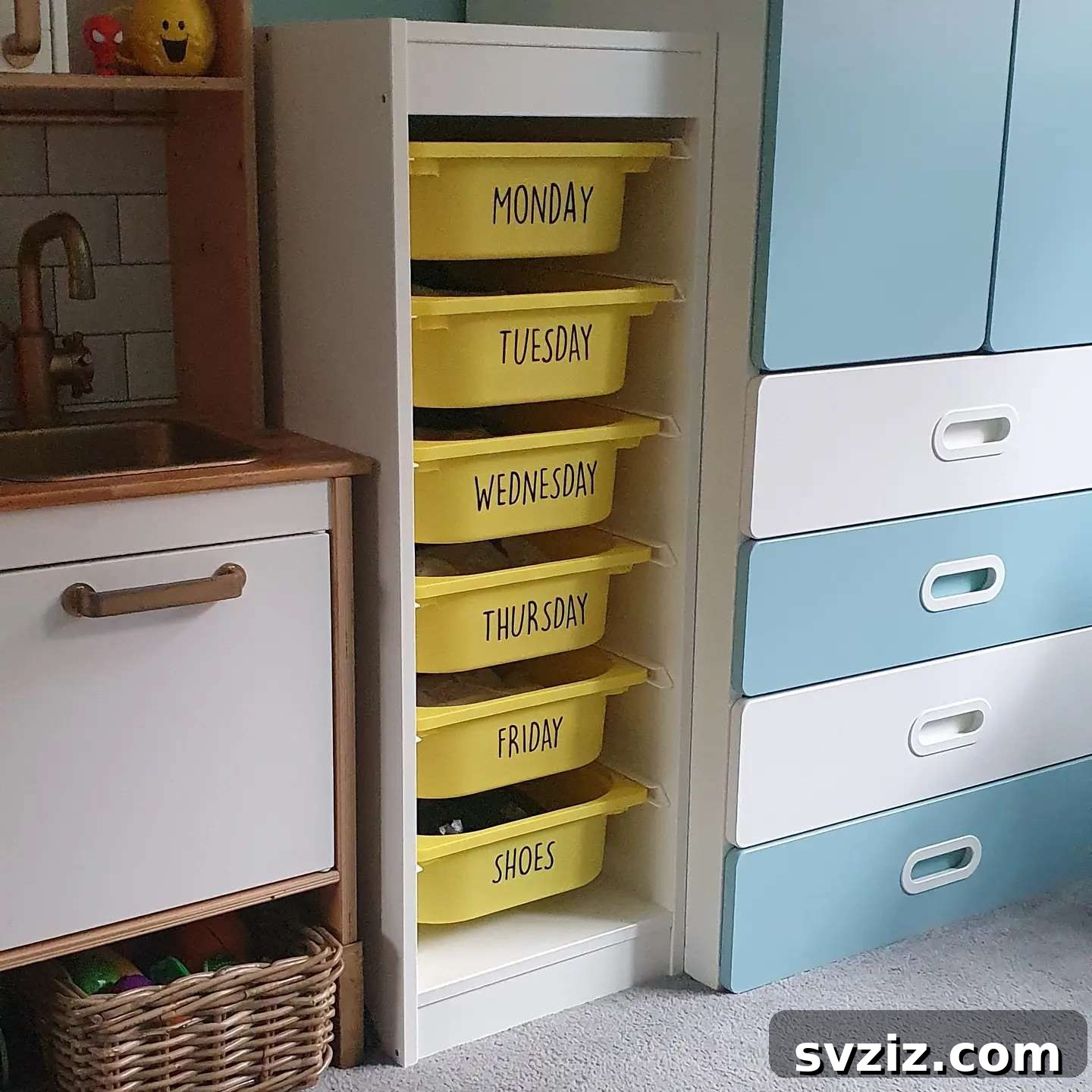 Weekday Organizer using IKEA Trofast units for school clothes and sports gear, labeled by day.