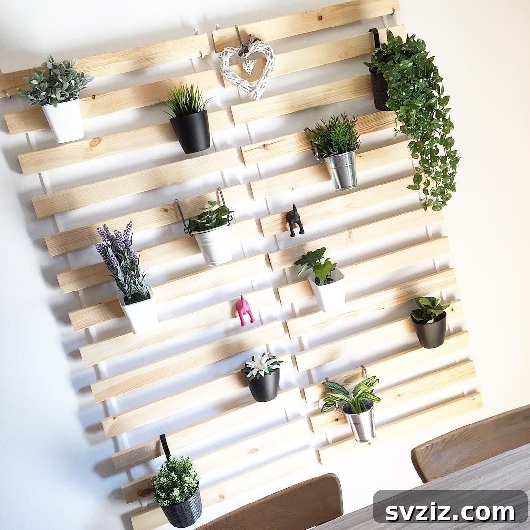 Bed Slat Plant Wall, an IKEA hack creating a vertical indoor garden with repurposed bed slats.