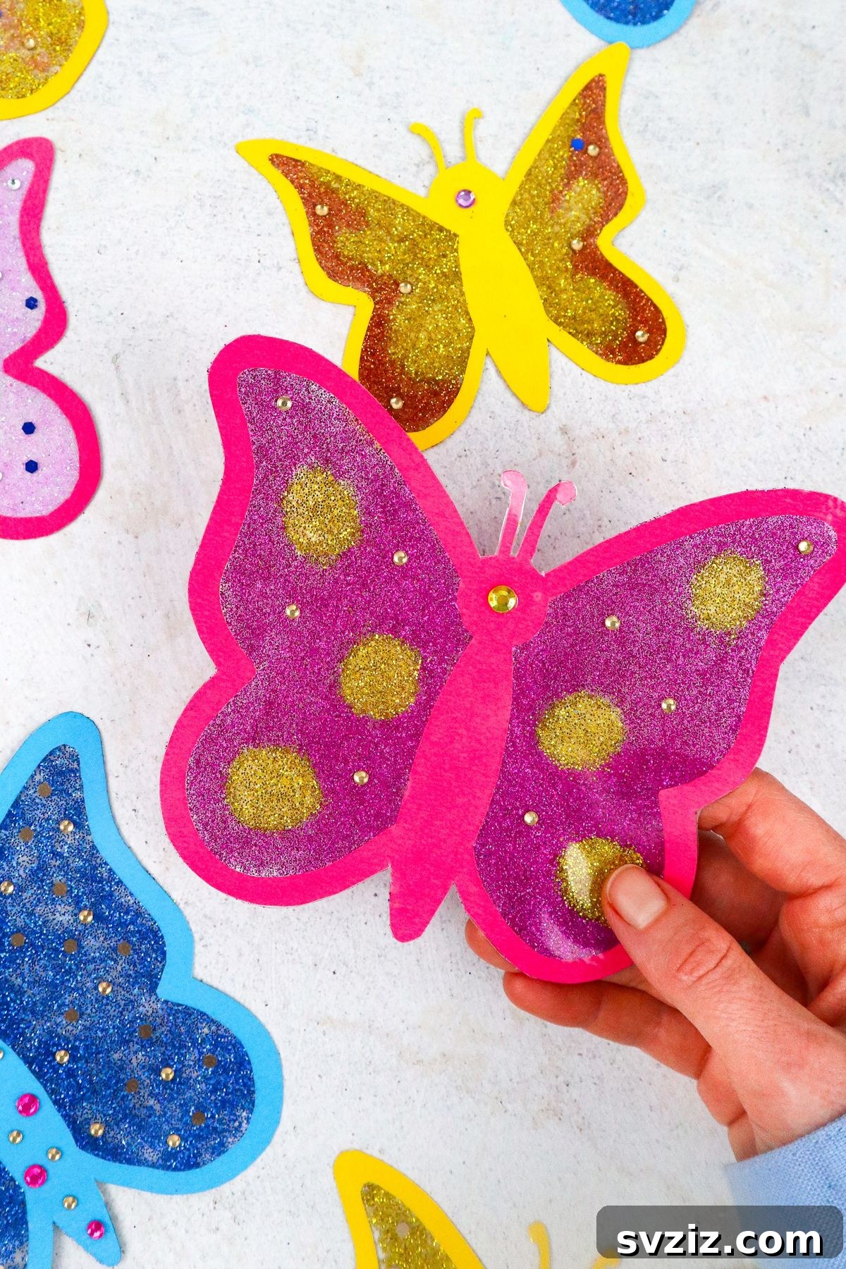 A unique butterfly suncatcher glowing in natural light