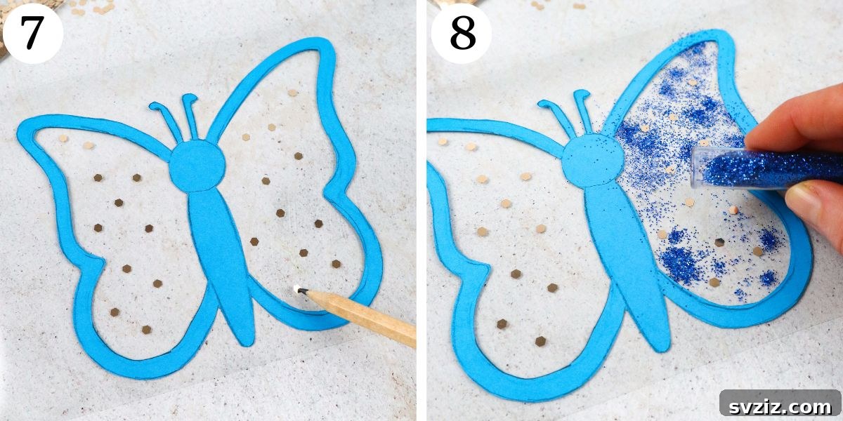 Decorating the ingenious butterfly suncatcher with glitter and confetti