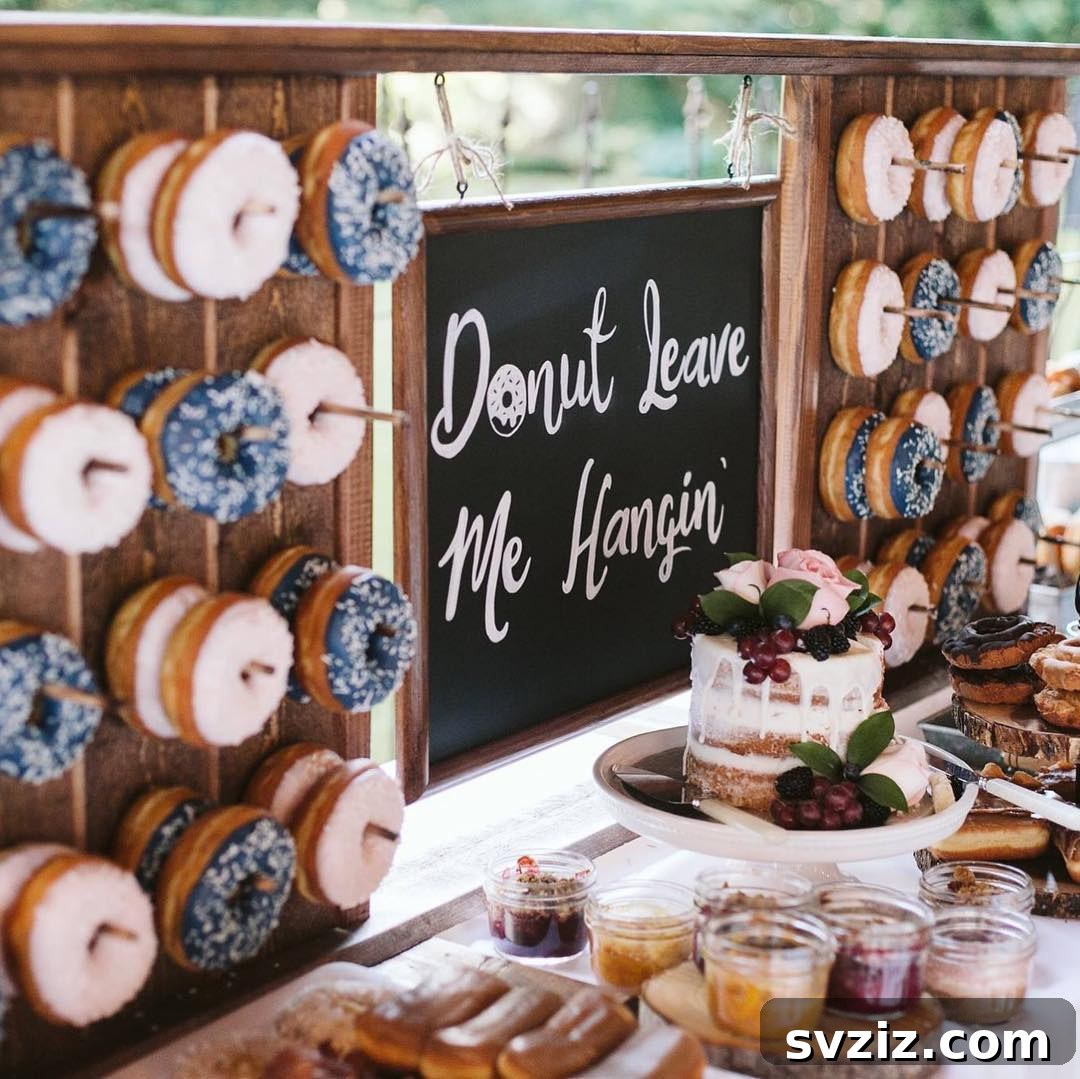 Exquisite Wedding Dessert Spreads 11 A fun and interactive 'Donut Leave Me Hangin’' wall, featuring an array of frosted, glazed, and sprinkled donuts on a stylish board.