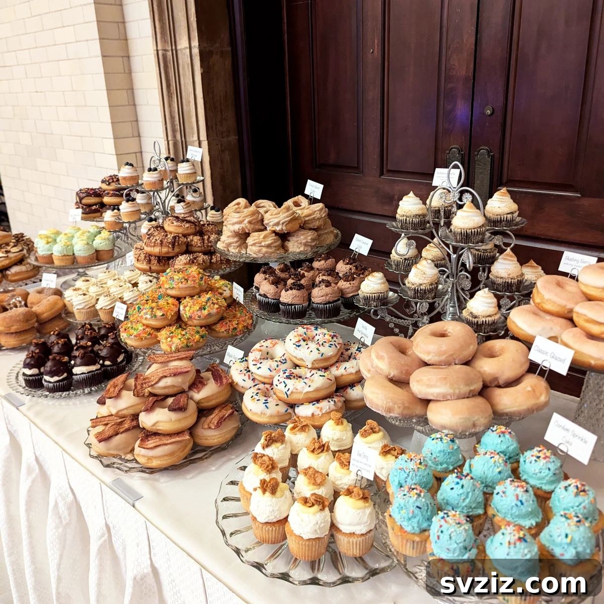 Exquisite Wedding Dessert Spreads 10 A vibrant and enchanting 'Sprinkle & Swirl Sweet Bar' featuring an array of colorful desserts, including bacon-topped donuts and sprinkle-covered cupcakes.