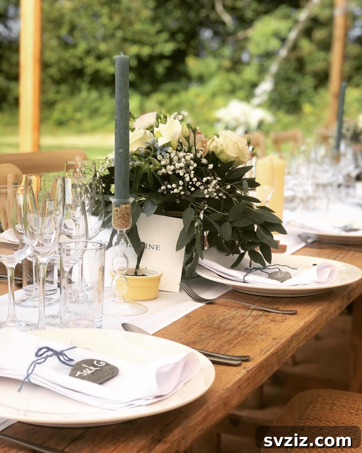 Charming Rustic Long Table Wedding Inspiration 21 Rustic Long Table with Green-Gray Candles in Glass Holders filled with Wood Shavings