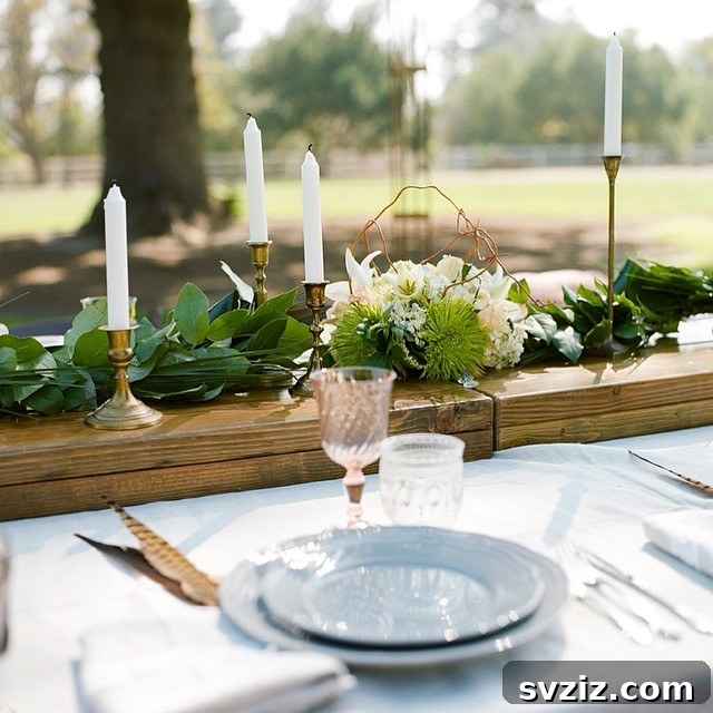 Charming Rustic Long Table Wedding Inspiration 25 Rustic Wedding Table with Baby Blue and Pink Color Palette, enhanced by Pink-Tinged Goblets