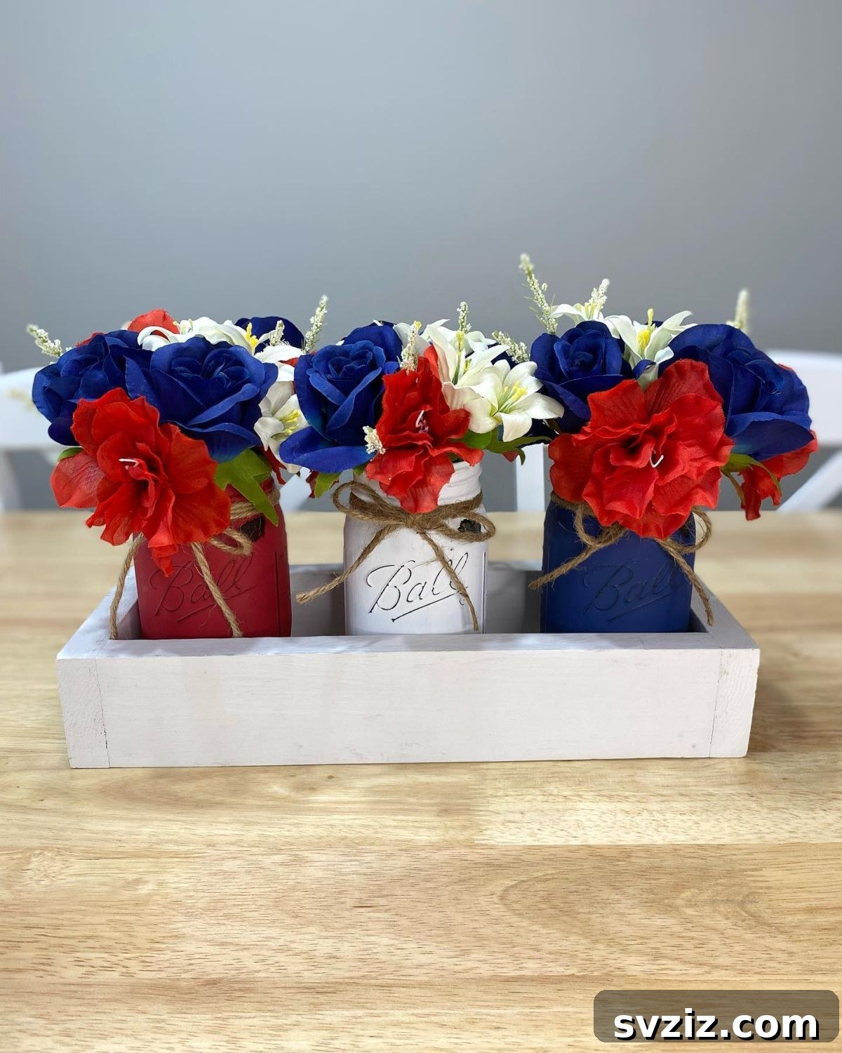 Show Your Spirit: Easy DIY 4th of July Table Decorations 23 DIY Red, White, and Blue Mason Jar Centerpiece for Patriotic Decor