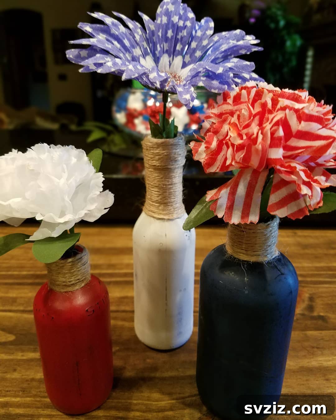 Show Your Spirit: Easy DIY 4th of July Table Decorations 25 DIY Repurposed Bottle Vases with Patriotic Flowers for 4th of July