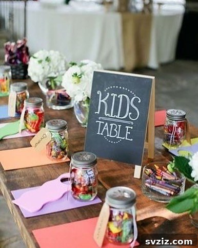 17 Enchanting Wedding Table Concepts for Your Youngest Attendees 3 1. Chalkboard Sign and Treat Jars