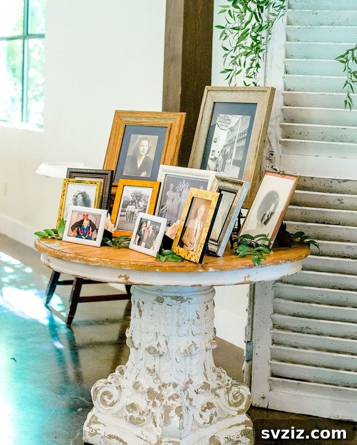 A large, ornate table serving as a beautiful wedding memory display with framed photos.