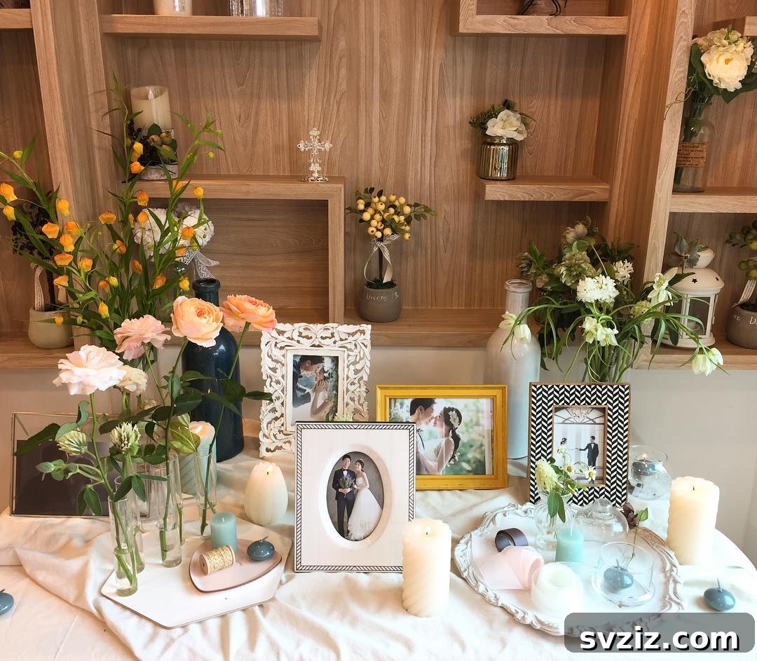 Richly decorated wedding memory table with trinkets, flowers, and photos enhancing the wedding theme.