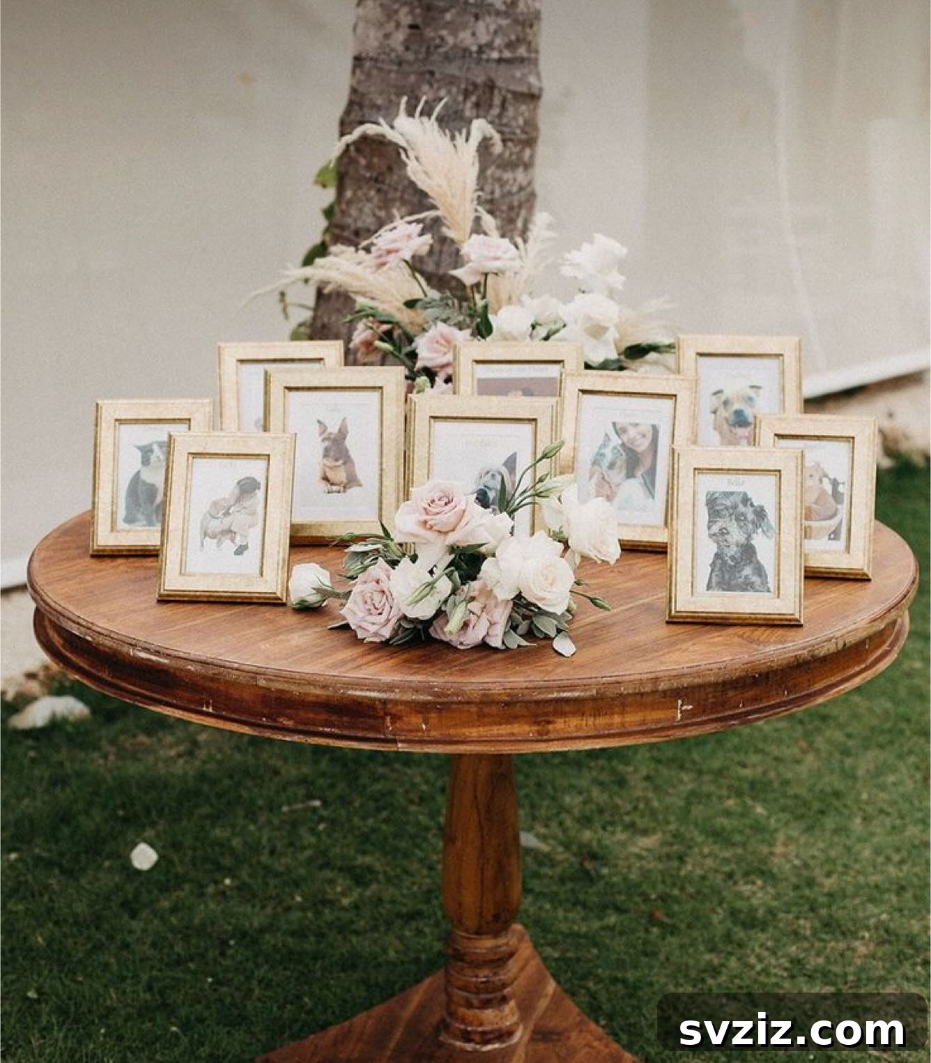 Wedding memory table featuring photos, delicate florals, and a special tribute to pets.