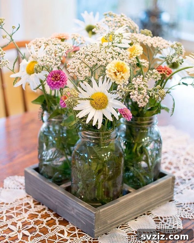 23 Effortless DIY Summer Dining Table Centerpieces 11 9. Wildflower Mason Jars