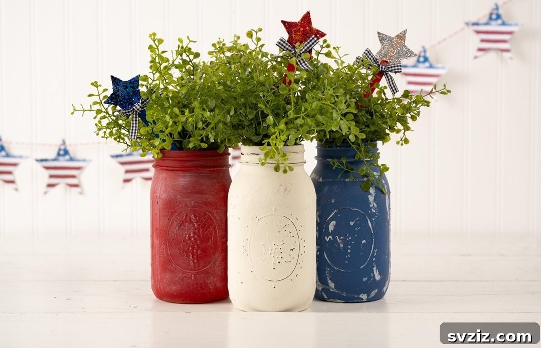 23 Effortless DIY Summer Dining Table Centerpieces 14 12. Red, White, & Blue Mason Jars