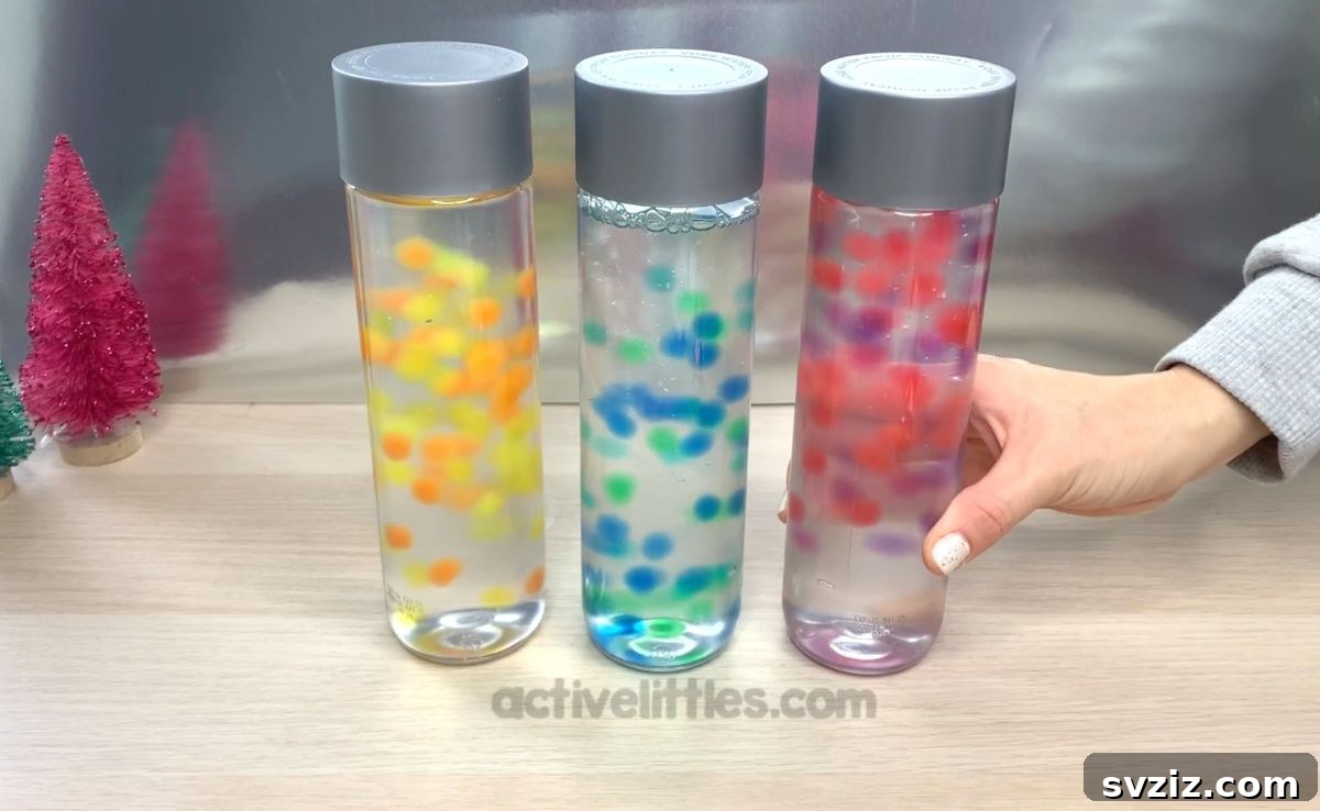 Colorful calming sensory bottles made with water beads.