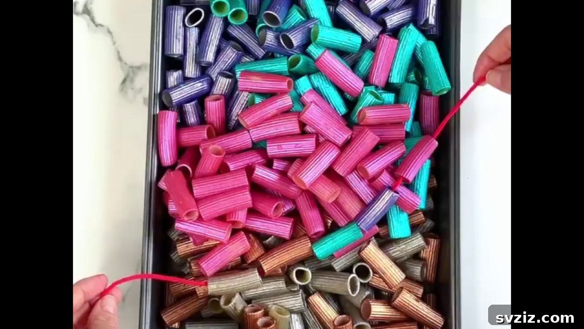 Vibrantly dyed pasta noodles for sensory play.