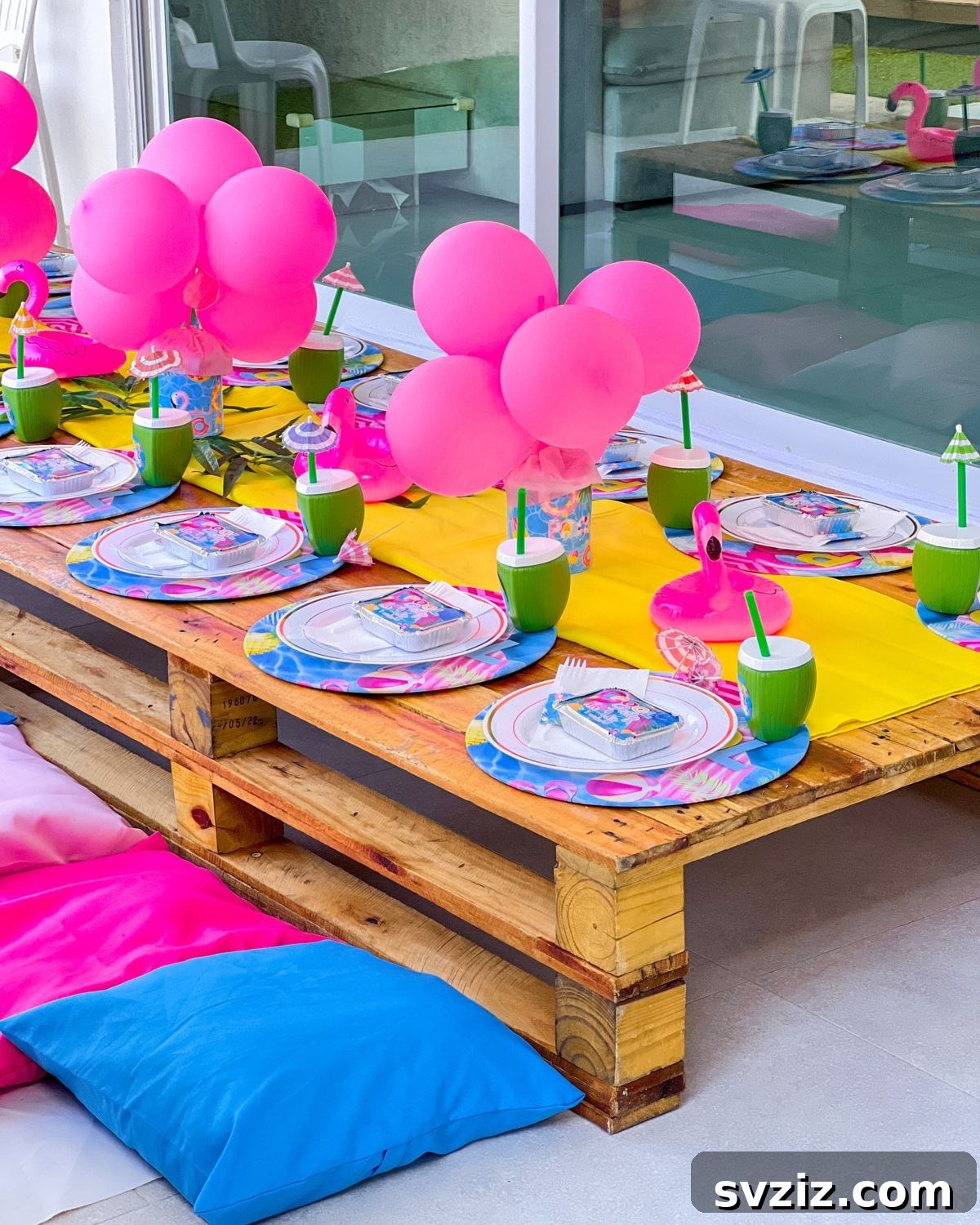 Splash into Summer: Creative Pool Party Ideas 11 Bright and colorful kid's tablescape with pink balloon bouquets.