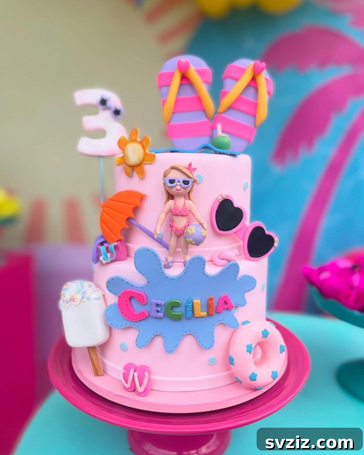 Splash into Summer: Creative Pool Party Ideas 14 Adorable pool-themed birthday cake with miniature figures.