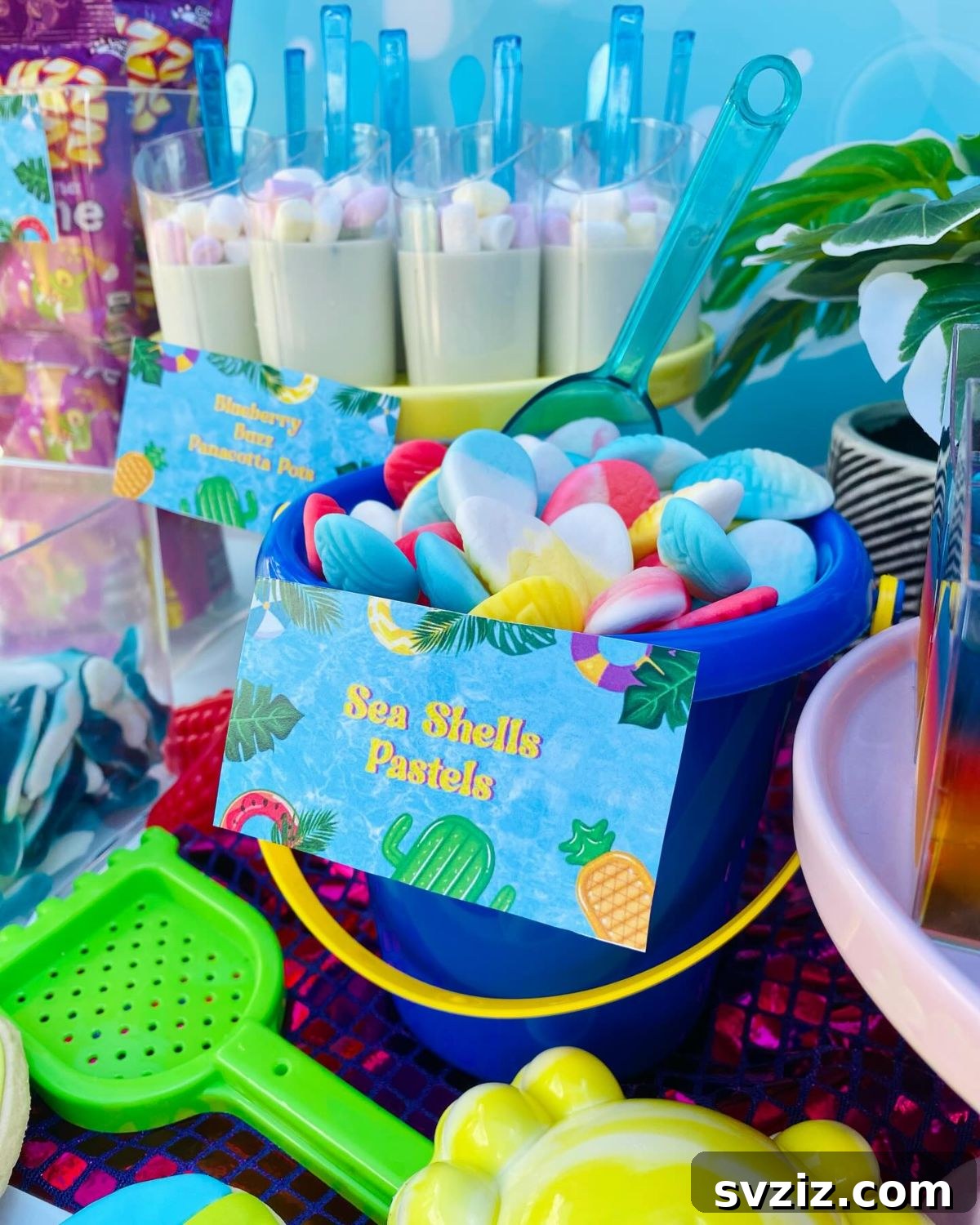 Splash into Summer: Creative Pool Party Ideas 22 Themed pool party candy bar with various sweets.
