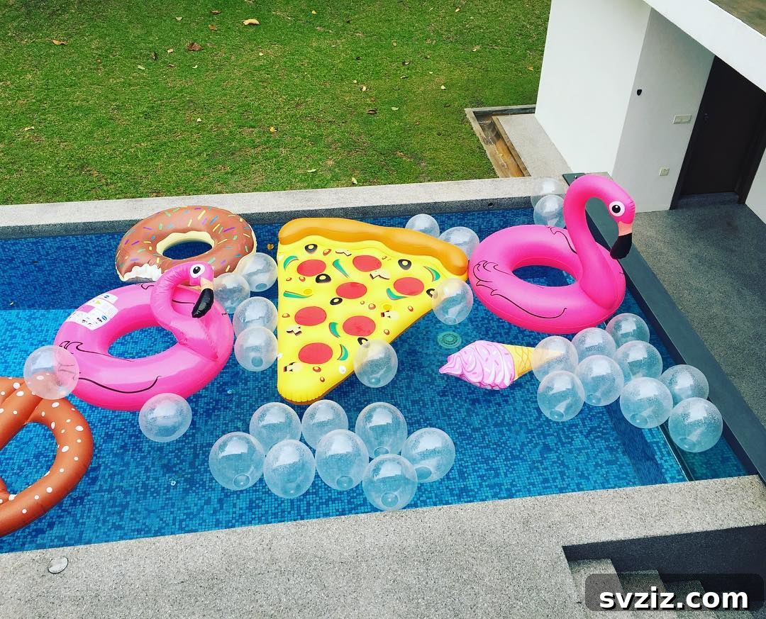 Splash into Summer: Creative Pool Party Ideas 8 Pool filled with various fun inflatables for a party.