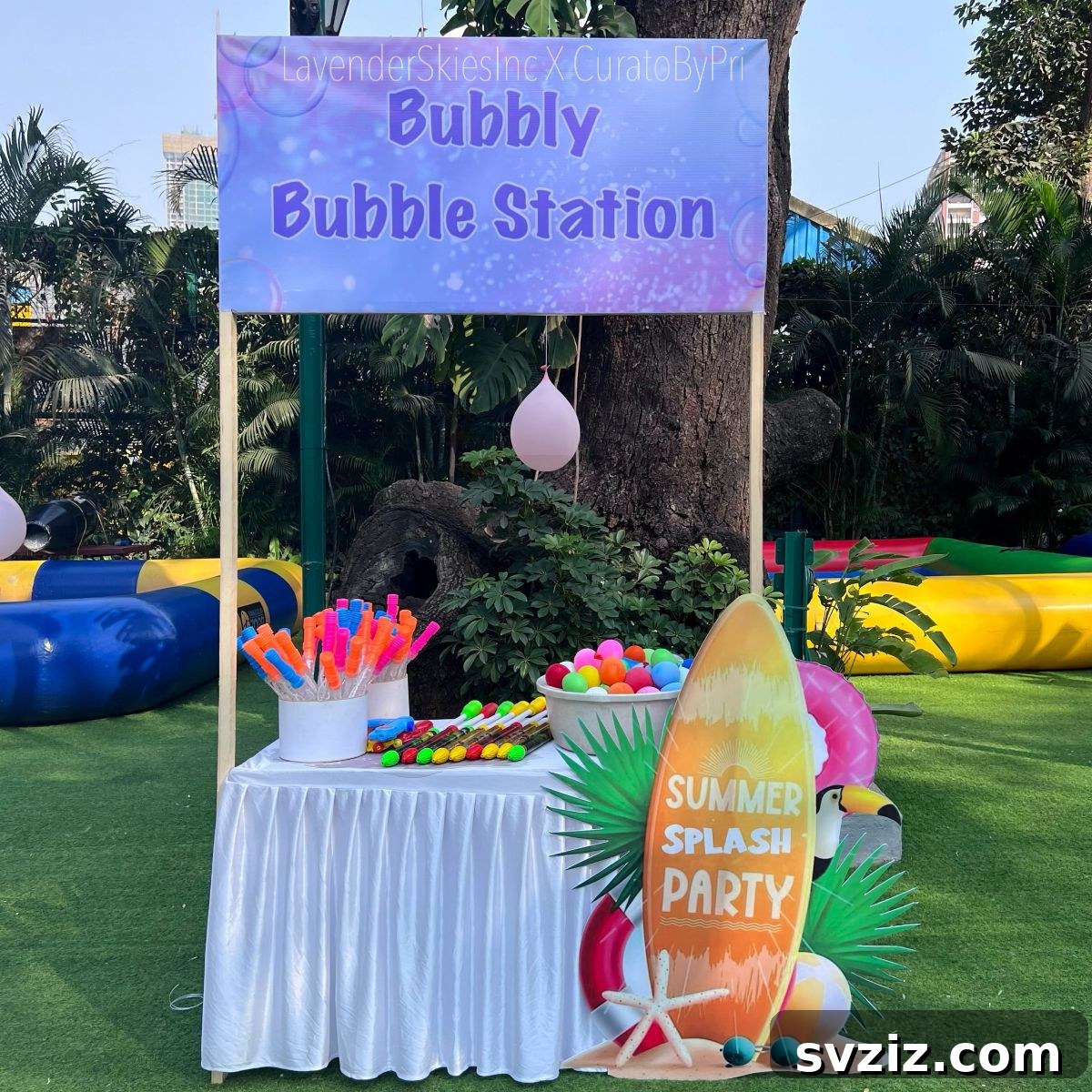 Splash into Summer: Creative Pool Party Ideas 9 Engaging pool party favor station with beach balls and inflatables.