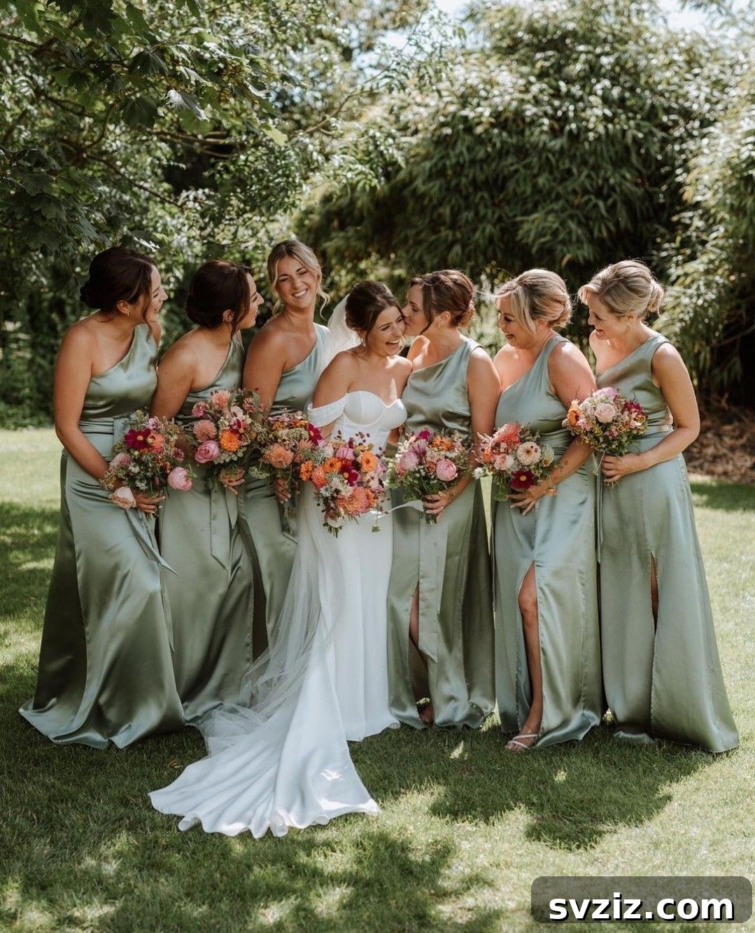 Stunning Summer Wedding Color Palettes 19 Ethereal bridesmaids in tranquil sage green dresses, an ideal choice for a serene beach or nature-inspired wedding