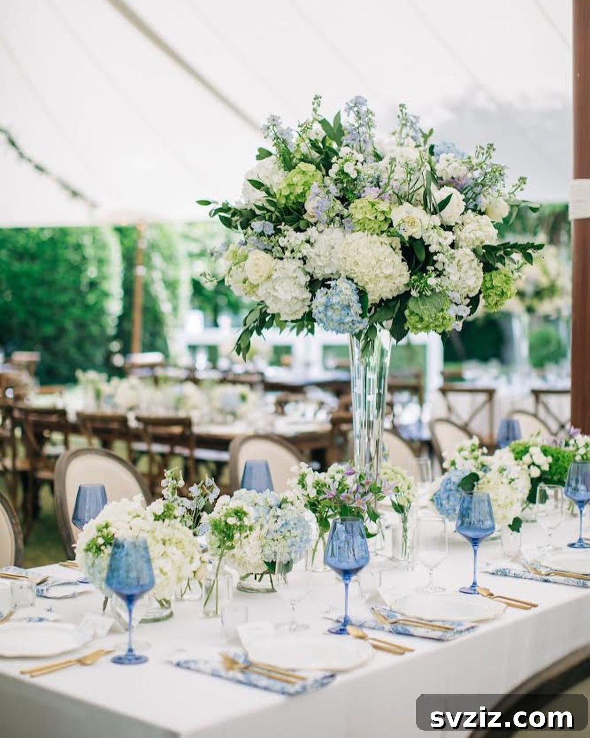 Stunning Summer Wedding Color Palettes 21 Warm and welcoming wedding decor incorporating blue accents like blue wine glasses, inspired by 'something blue'
