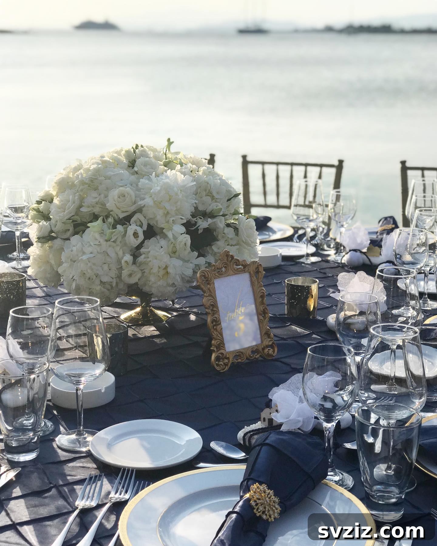 Stunning Summer Wedding Color Palettes 24 Elegant navy blue summer wedding theme with a large white centerpiece for contrast, ideal for a beach celebration
