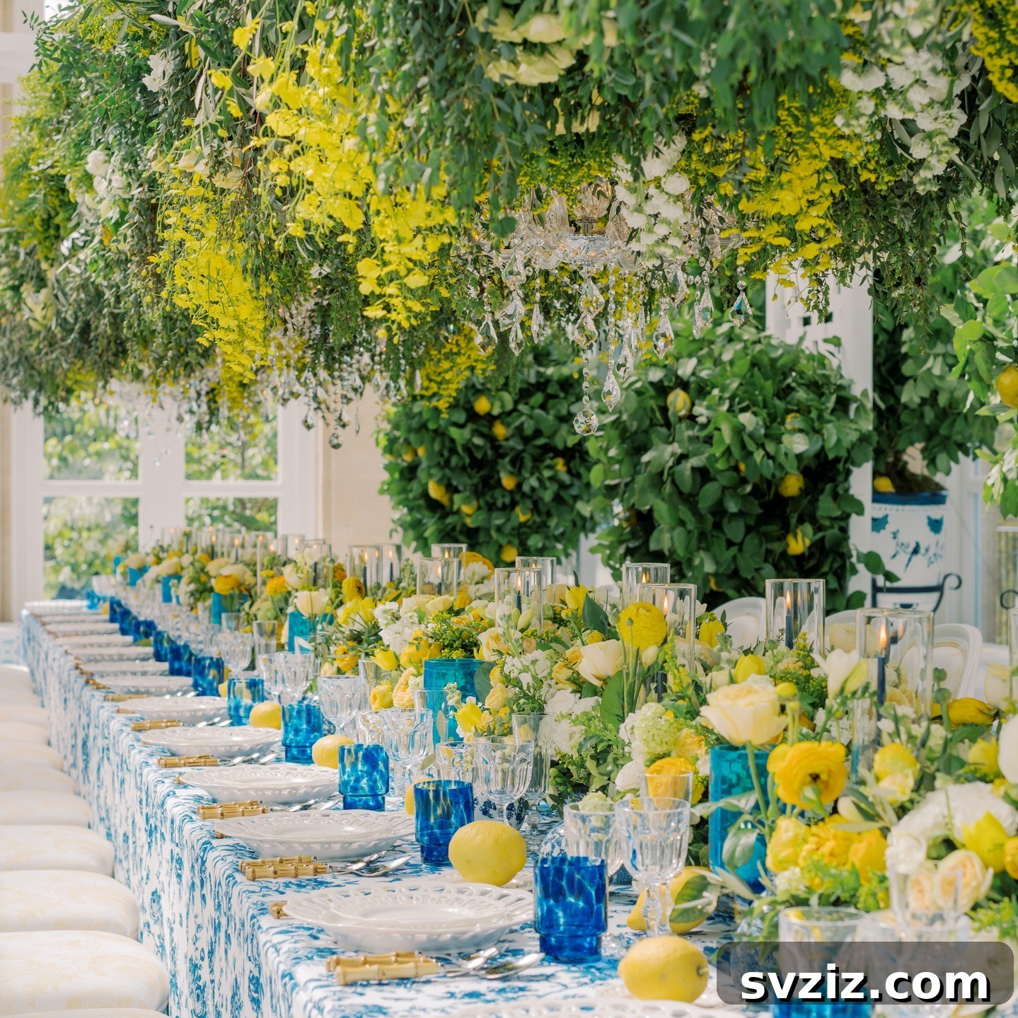 Stunning Summer Wedding Color Palettes 29 Breathtaking blue and yellow wedding tablescape with yellow roses and blue & white dishware for an outdoor summer wedding