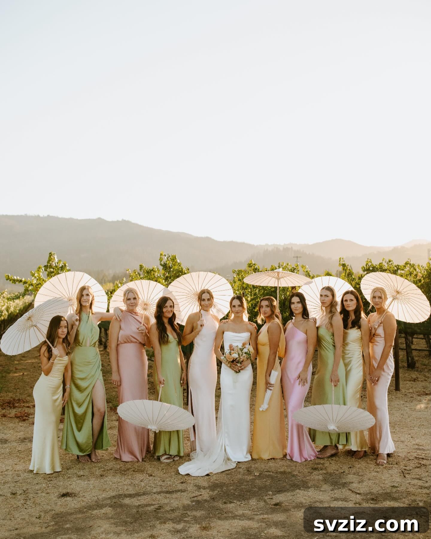 Stunning Summer Wedding Color Palettes 33 Elegant satin bridesmaid dresses in chic pastel colors, setting a romantic and summery vibe for a wedding