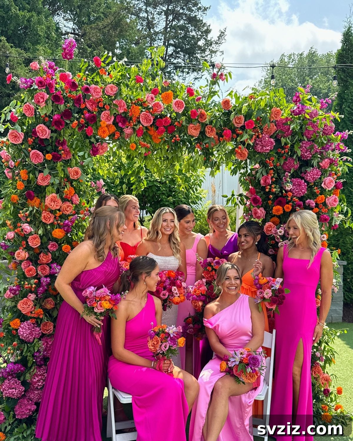 Stunning Summer Wedding Color Palettes 9 Multi-shaded pink wedding decor with accents of orange and purple for a vibrant summer celebration