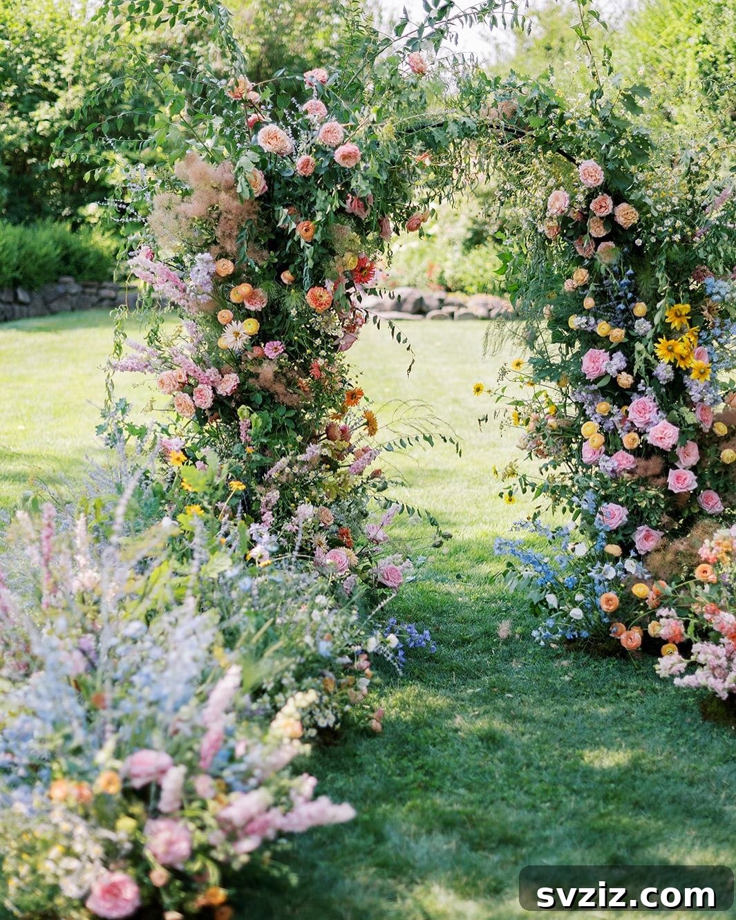 Dreamy floral archway for a garden wedding ceremony