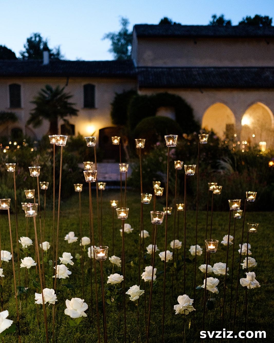 Enchanting lanterns and flowers for an intimate garden wedding