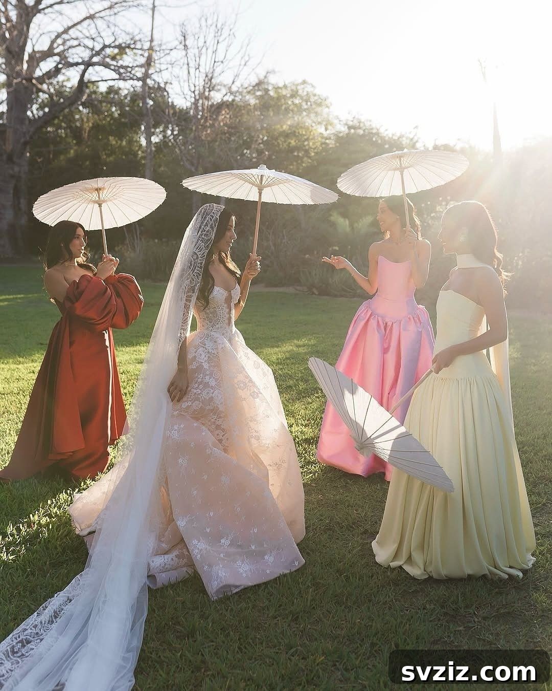 Elegant wedding parasols for guest comfort in a garden wedding