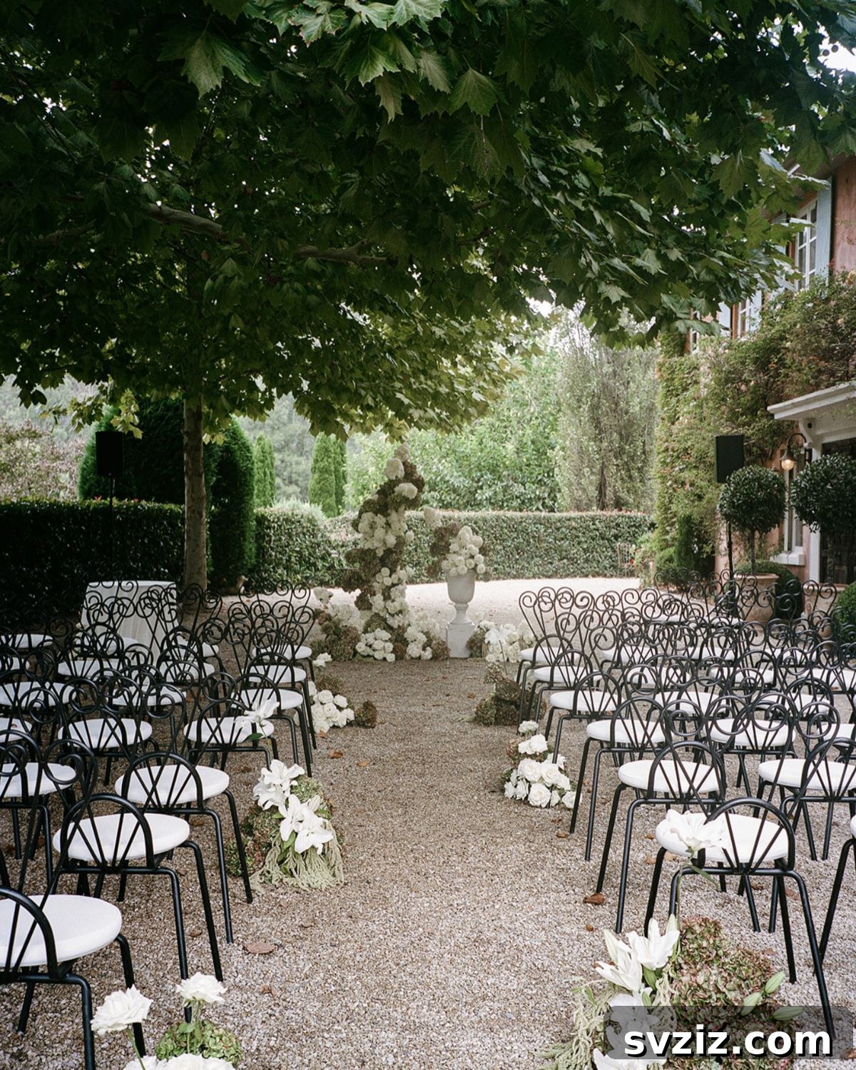 Ethereal White and Green Ceremony Setup for a garden wedding
