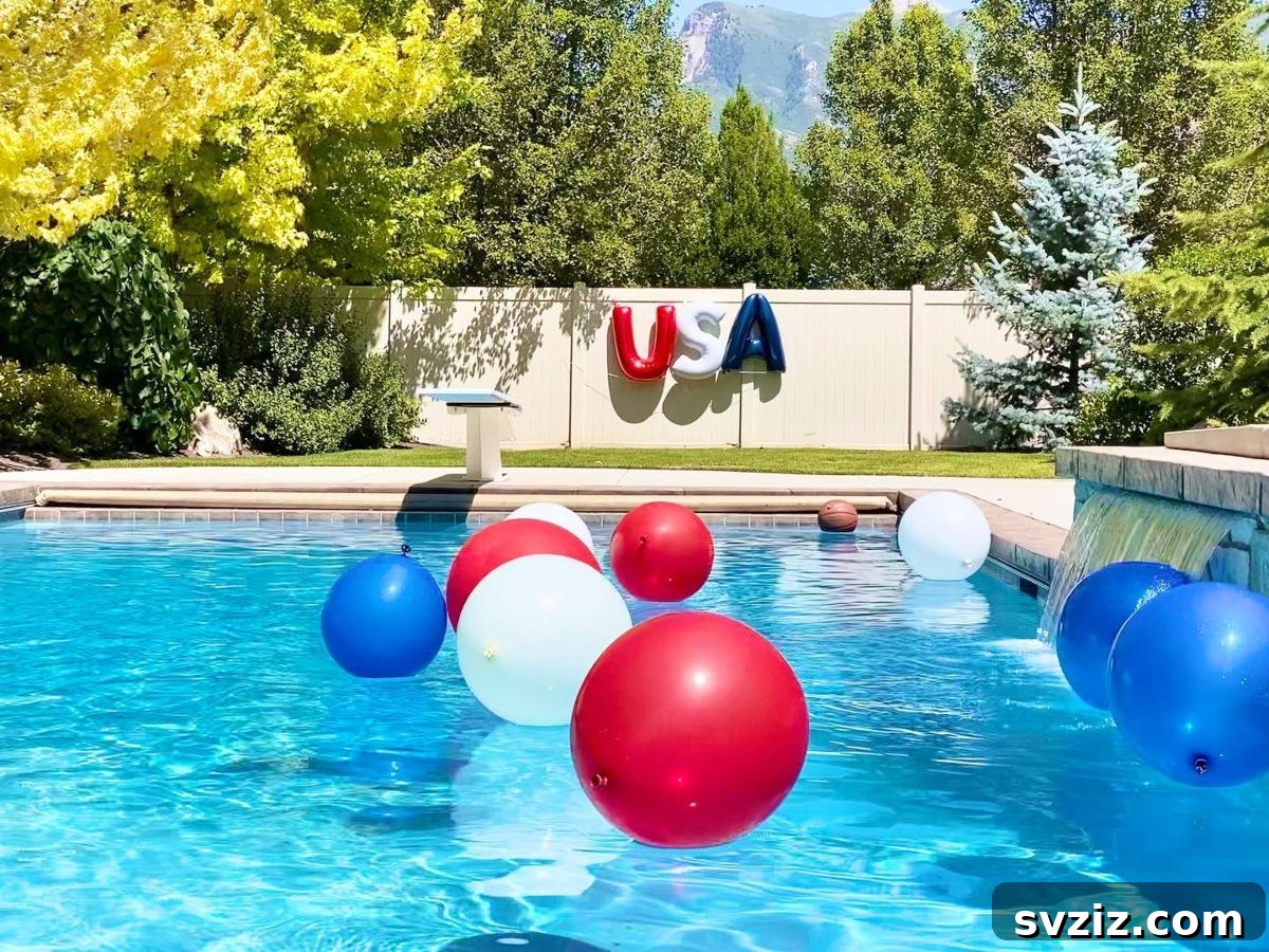USA themed foil balloons in red, white, and blue for a patriotic pool party.