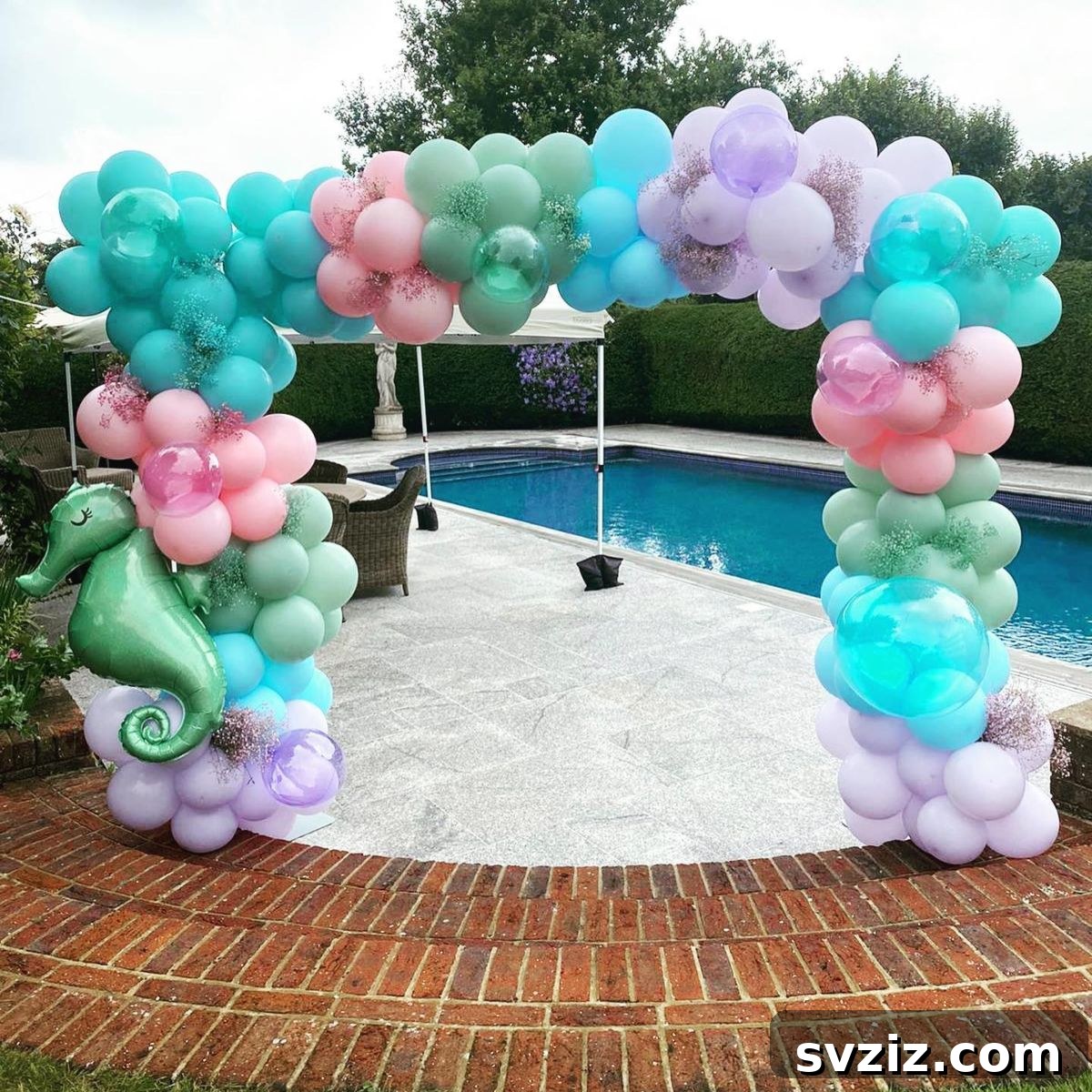 Colorful balloon arch with a charming seahorse balloon, perfect for an underwater themed pool party.