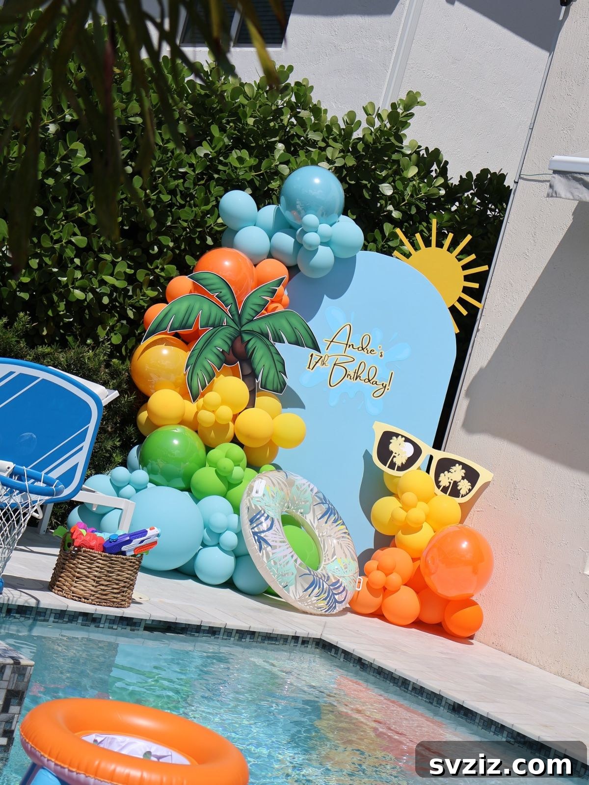 Festive birthday balloon display with vibrant colors and fun party accessories.