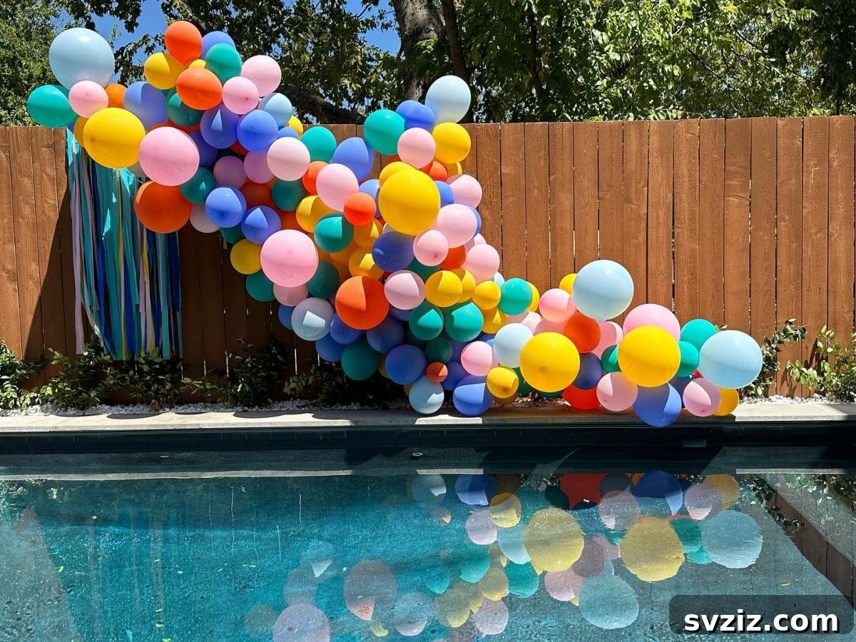 Explosion of colorful balloons creating a vibrant and exciting atmosphere for a pool party.