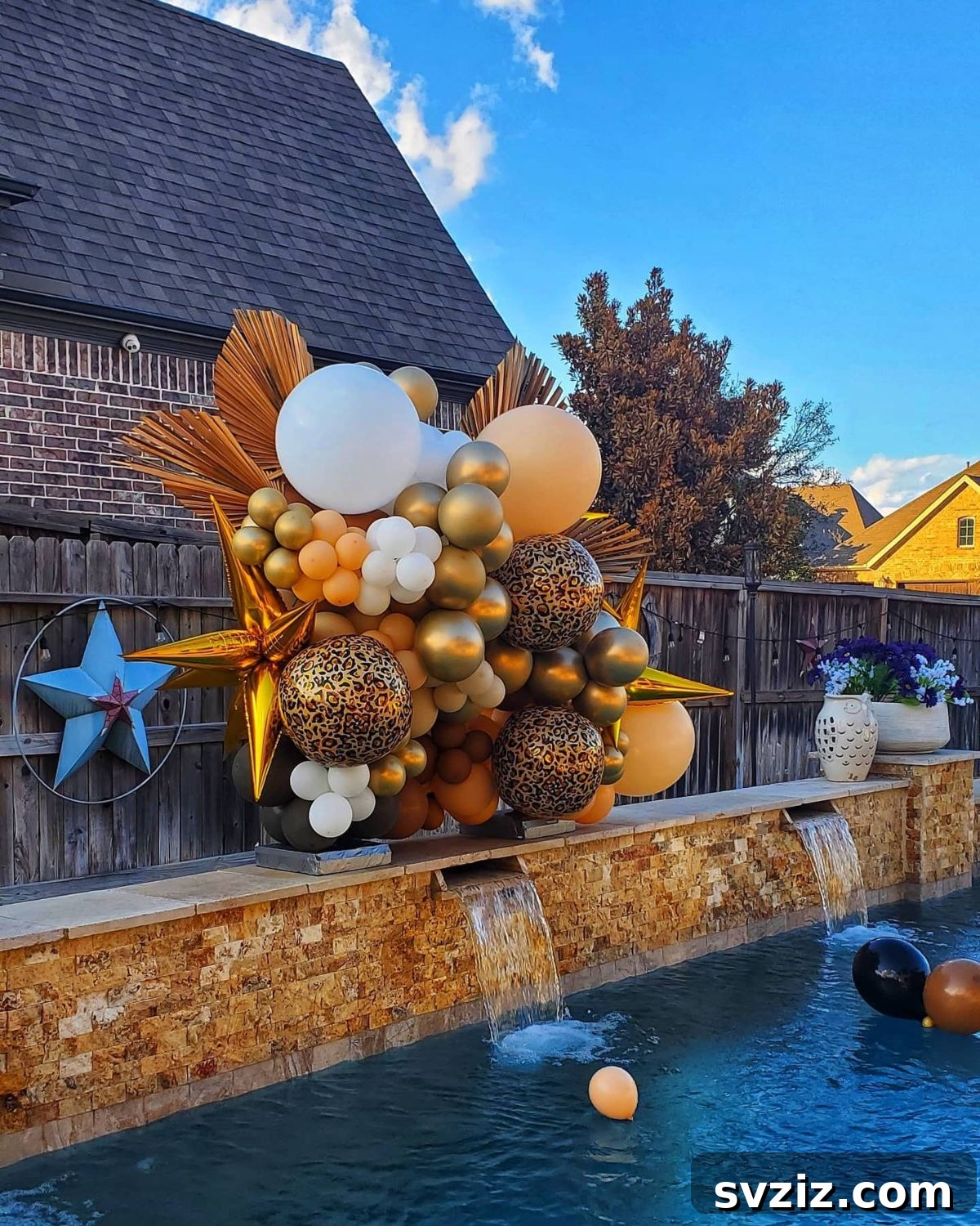 Glitzy gold balloons in varying shades and textures for a sophisticated pool party celebration.