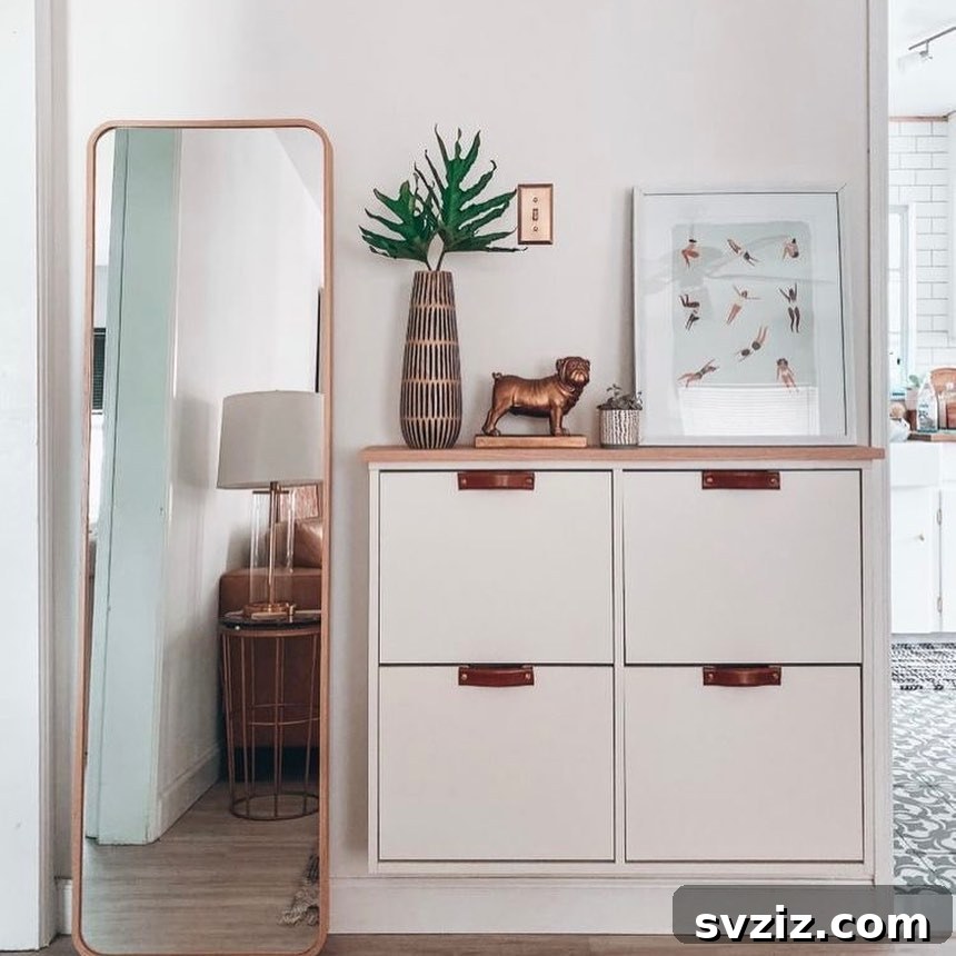 23 Clever IKEA Hacks to Maximize Small Entryways 7 5. Slim and Simple White Storage Unit