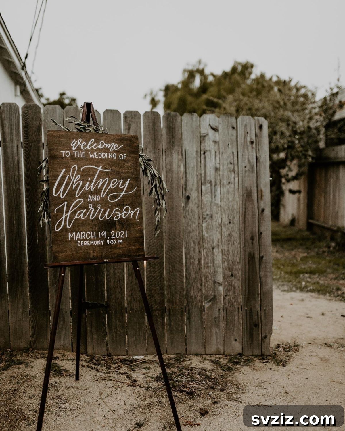 23 Dreamy Backyard Micro Wedding Concepts 14 Personalized welcome sign with names and wedding date for a backyard celebration