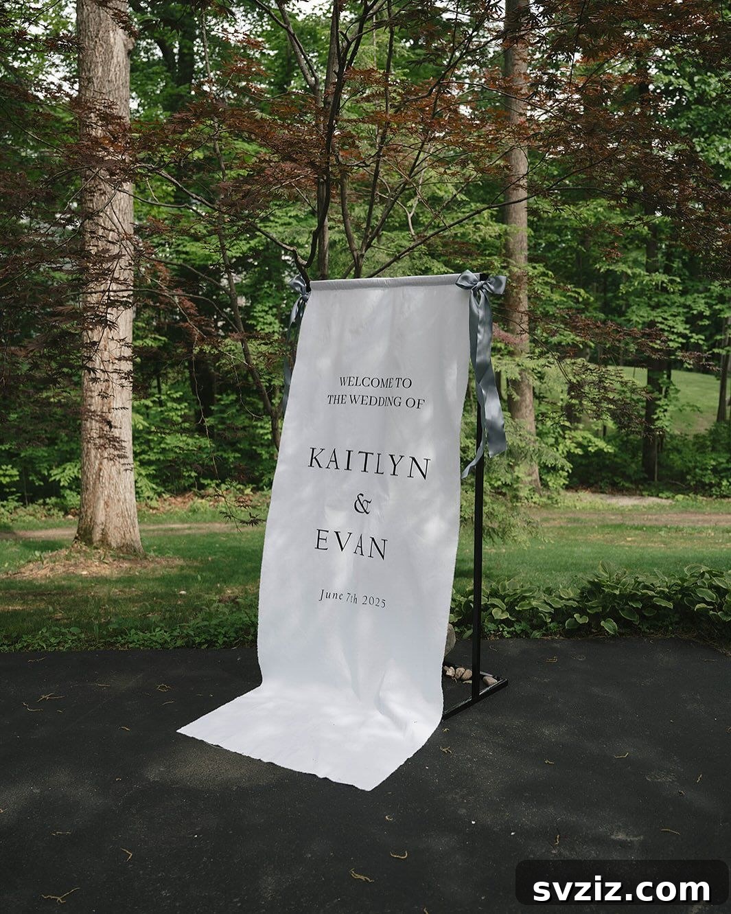 23 Dreamy Backyard Micro Wedding Concepts 20 Elegant white welcome banner with black script for a wedding